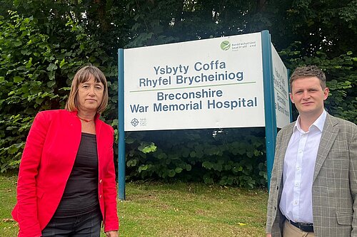 Jane Dodds MS and David Chadwick MP in front of Brecon Hospital