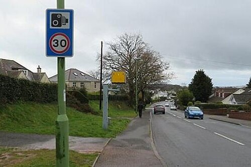 Speed camera beside residential road